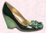 These patent green wedge shoes are from Shelly.