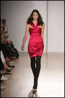 Oasis - Gleaming satin works it�s magic on simple silhouettes giving a strong and dramatic look to simple dress shapes and thigh grazing skirts. 