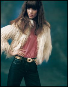 Topshop - Cream cropped Shearling jacket, £65/€96, sherbet pink frill blouse £28/€40, Indigo wide leg Mel jean £40/€60, Gold snake effect metal belt £30/€45. 