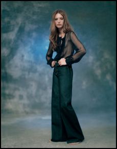 Topshop - Charcoal chiffon frill blouse £35/€52, Indigo wide leg 'Mel' jean £40/€60. 