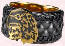 Idol ring. dol London Jewellery 2008 - Razor Thin - diamond set ring; a unisex silver ring, pave set with treated black diamonds, with a heavy black rhodium and yellow gold plated finish.  Male : �690. Female : �650. 