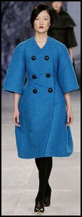 Shapely curved cartoon blue, cotton and silk boucle coat, by Aquascutum - £2500.