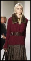 Oscar de la Renta cable knit cardigan with fur collar.