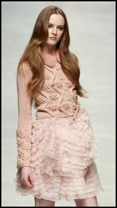 Knitwear Fashion trends 2008. Winter white, soft greys and soft pastel tints worked well for knitwear. This lovely textured knit with a nod to folkloric Austrian knits is by Blumarine.