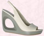 Shoe 7  - Nine West white wedge shoe with cut out heel available from from John Lewis.