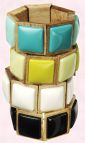 Cuff fashion trends at fashion-era.com - Wallis Jewellery Spring Summer 2008 Jewellery - Plastic inlay wood stretch bangles in aqua, lemon greens, white and black. �8 �13.