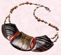 Wooden plate necklace on beaded rope - �10 - Boho Tech Freedom at Topshop .