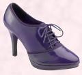 Purple ladies laced heel brogue and stud strap shoes.