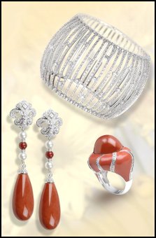 Jewels of Ocean on fashion-era. Diamond cuff and rich coral ring and earrings with diamonds.