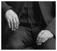Mr. Weddell's hands and wedding ring.
