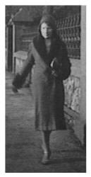 Gwen wears a wrap coat of 1931
