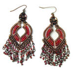Eye-catching bronze coloured drop earrings decorated with chains and lots of tiny iridescent red beads 