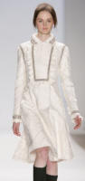 Karakul coat gold trim by J Mendel