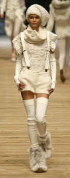 DOLCE & GABBANA Collection - Fox boots, cream hot pants, braces, knitwear and hat.