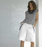 Black and white stripe top with crochet trim £22/€35, White linen  shorts £25/€40 Braces £6/€10