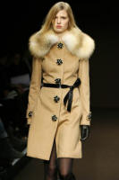 Caramel wool coat with jewelled buttons and fox collar
