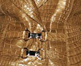fabric fashion, Gucci skin - Finishes given to many textiles especially leather includes burnishing it with a metallic cast