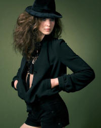 Vintage fedora �25. Colours available: Black and plum Pussy bow jacket �45. Corduroy hot pants �22. Chunky beaded necklace �35