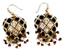 Gold with black or deepest wine red enamel Lac jewellery earrings are from Venkatraman Jewels of Jaipur in India.