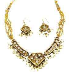 Gold toned beautiful Indian fashion jewellery necklace and earrings from Venkatraman Jewels of Jaipur India. 