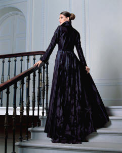 Vera Mont Collection - This fabulous black taffeta coat left has a detachable train made of a sea of frayed ribbons. The matching evening dress beneath also has a small train.