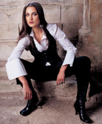 Wallis shirt �35, black cropped trousers �35, grey pinstripe halter waistcoat �40.