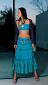 Ecuador -  Ribbed knitted shrug �27 Silk scarf as bandeau �17 Gypsy embroidered tiered skirt �45 Jewelled toe thongs �40 Jewellery and accessories from a selection at Wallis