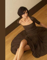 This dark brown dress is by Graeme Black and could be styled in variety of ways to make it look different