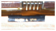 Over bright blurred picture of vintage handbag Mappin and Webb leather label.