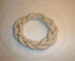 Plait the dough into a circle.