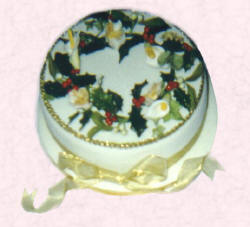 Picture of a Christmas cake with sugarcraft holly wreath.