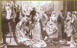 Fashion history. Picture of young Edwardian ladies arranging their dress at their coming out ceremony.