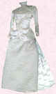 Picture of cream bustle mid Victorian style small costume. Fashion history and costume history dolls