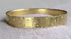 Love2have.co.uk diamond bangle in 18ct gold.