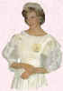 Princess Diana in a pale creamy lemon puff sleeve dress. Costume History, fashion history.