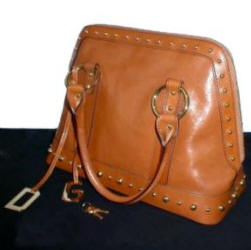Great handle design whatever the view on a Dolce & Gabbana handbag.