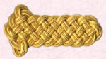Gold braid epaulette.