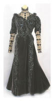 Elegant antique vintage evening gown, c.1890 and made from black velvet.