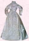 Picture of  cream Victorian style small costume. Fashion history and costume history dolls