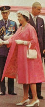 The Queen wearing a duster coat