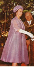 The Queen wearing a duster coat