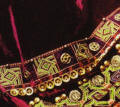Folkloric Russian influenced decoration on plush wine velvet.