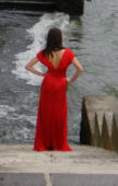 Red gown photographed on the Seine