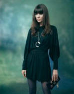 Topshop Autumn/Winter 2007 - Dark green batwing dress �70/�104, Gold star studded clutch bag �15/�22, navy blue opaque tights �4/�6.