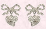 Pave Diamant� bow and heart earrings right are from Vivienne Westwood, and vailable from House of Fraser. Vivienne Westwood earrings �99/�149.