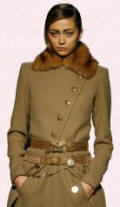 Gaultier coat - Military rich touches are created by golden ornamental frog fastenings or golden brass toned metal buttons. 