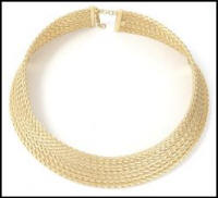Cleopatra style collar in gold.