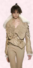 Givenchy - Clothes with reptilian leather effects help create a warrior women look. 