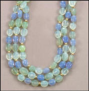 Totally enchanting pastel-tinted Olive, Sea Foam, & Blue 17" Chalcedony necklace with 14kt gold roundels and toggle clasp.