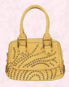 Paul Smith yellow handbag with studs.